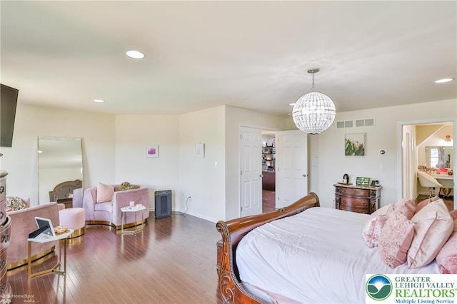 249 Danbury Dr, Upper Nazareth Twp, PA 18064 - bedroom featuring a chandelier, wood finished floors, and recessed lighting