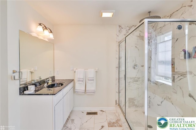 249 Danbury Dr, Upper Nazareth Twp, PA 18064 - full bathroom with vanity, a marble finish shower, and marble look tiles