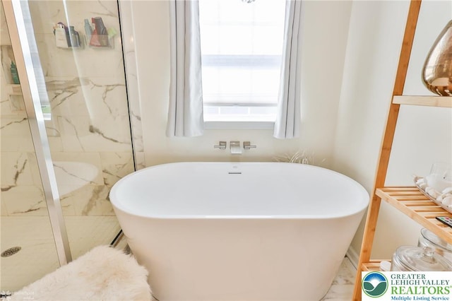 249 Danbury Dr, Upper Nazareth Twp, PA 18064 - bathroom with a freestanding bath and a marble finish shower