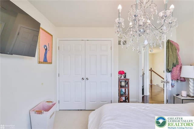 249 Danbury Dr, Upper Nazareth Twp, PA 18064 - bedroom featuring a chandelier and a closet