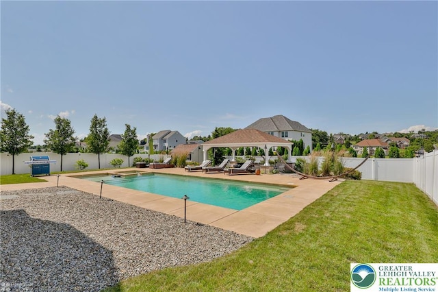 249 Danbury Dr, Upper Nazareth Twp, PA 18064 - view of pool with a gazebo, a fenced backyard, a residential view, a pool with connected hot tub, and a patio