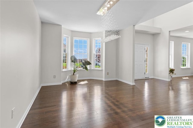 237 Danbury Dr, Upper Nazareth Twp, PA 18064 - spare room with hardwood / wood-style floors and a chandelier