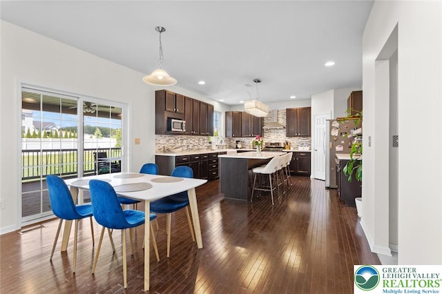 237 Danbury Dr, Upper Nazareth Twp, PA 18064 - dining area featuring dark wood-style flooring