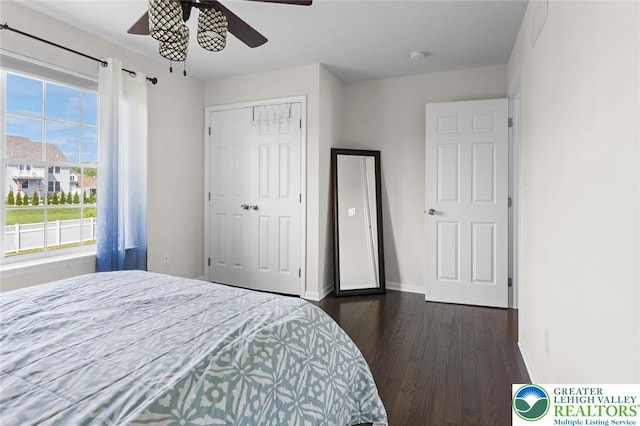 237 Danbury Dr, Upper Nazareth Twp, PA 18064 - bedroom with dark wood finished floors, a closet, and ceiling fan