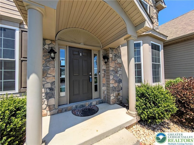 237 Danbury Dr, Upper Nazareth Twp, PA 18064 - entrance to property with stone siding and a porch