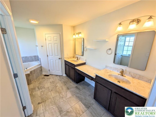 237 Danbury Dr, Upper Nazareth Twp, PA 18064 - full bathroom with two vanities and a garden tub