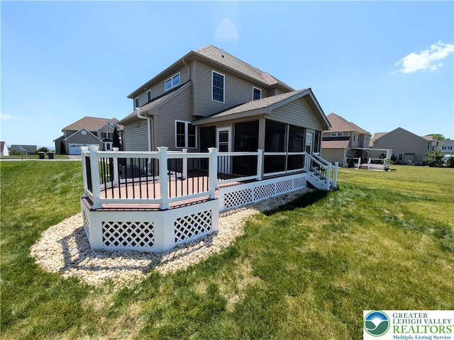 237 Danbury Dr, Upper Nazareth Twp, PA 18064 - rear view of property with a sunroom, a yard, and a deck