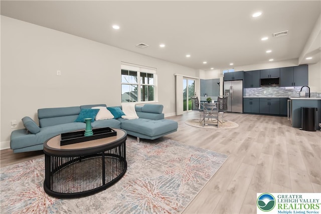 5635 Saucon Ridge Rd, Upper Saucon Twp, PA 18036 - living area with light wood-style flooring and recessed lighting