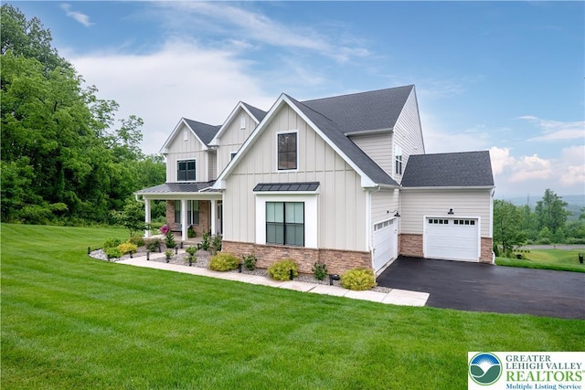 5635 Saucon Ridge Rd, Upper Saucon Twp, PA 18036 - modern inspired farmhouse featuring asphalt driveway, a garage, a front lawn, board and batten siding, and roof with shingles
