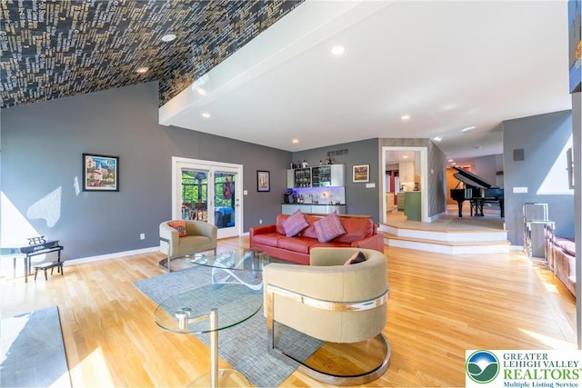 1488 Shelburne Ct, South Whitehall Twp, PA 18104 - living area featuring wood finished floors, vaulted ceiling, and recessed lighting