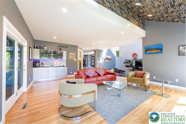 1488 Shelburne Ct, South Whitehall Twp, PA 18104 - living area featuring a dry bar, light wood-type flooring, healthy amount of natural light, and recessed lighting