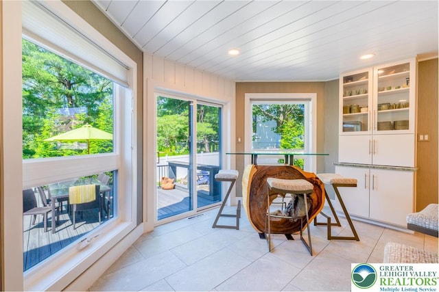 1488 Shelburne Ct, South Whitehall Twp, PA 18104 - sunroom / solarium featuring tile patterned flooring, wood ceiling, and recessed lighting
