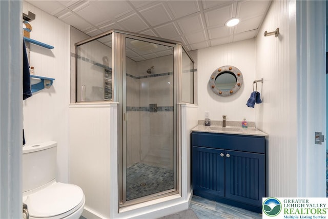 1488 Shelburne Ct, South Whitehall Twp, PA 18104 - bathroom featuring vanity, a shower stall, and wood finished floors