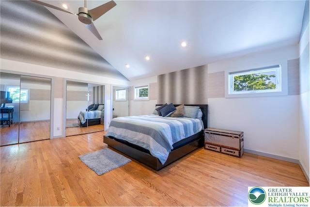 1488 Shelburne Ct, South Whitehall Twp, PA 18104 - bedroom with multiple windows, two closets, lofted ceiling, wood finished floors, and ceiling fan