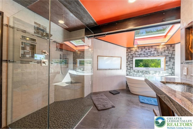 1488 Shelburne Ct, South Whitehall Twp, PA 18104 - full bath featuring a soaking tub, a tile shower, and vanity