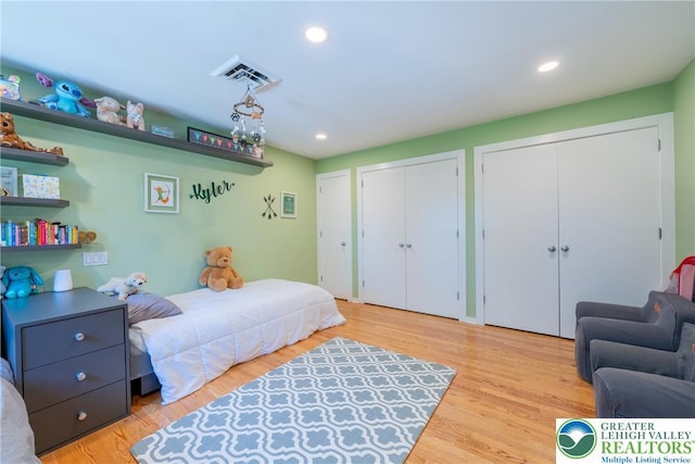1488 Shelburne Ct, South Whitehall Twp, PA 18104 - bedroom featuring multiple closets, recessed lighting, and wood finished floors