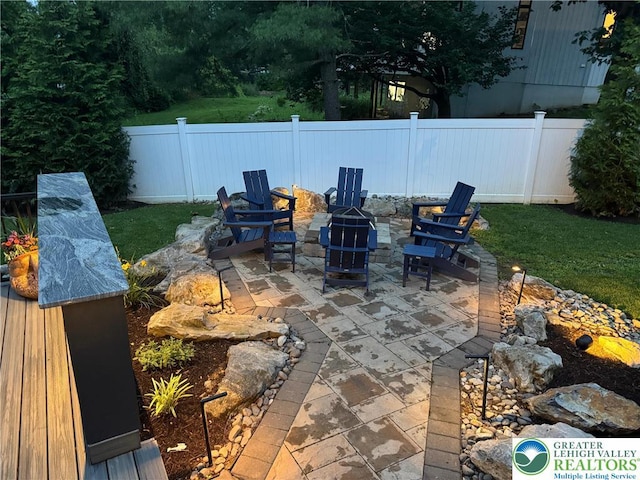 1488 Shelburne Ct, South Whitehall Twp, PA 18104 - view of patio with an outdoor fire pit