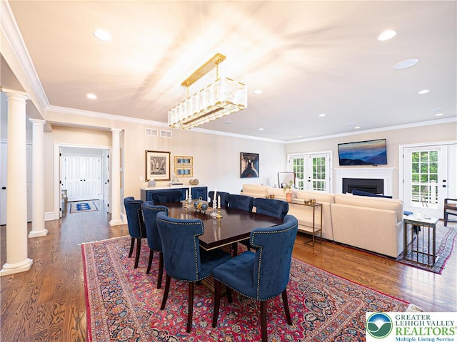 2063 Forge Run, Bethlehem City, PA 18015 - dining space with ornate columns, healthy amount of natural light, recessed lighting, dark wood finished floors, and ornamental molding
