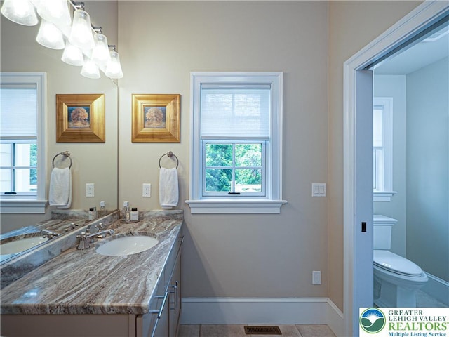 2063 Forge Run, Bethlehem City, PA 18015 - bathroom featuring vanity, plenty of natural light, and tile patterned floors
