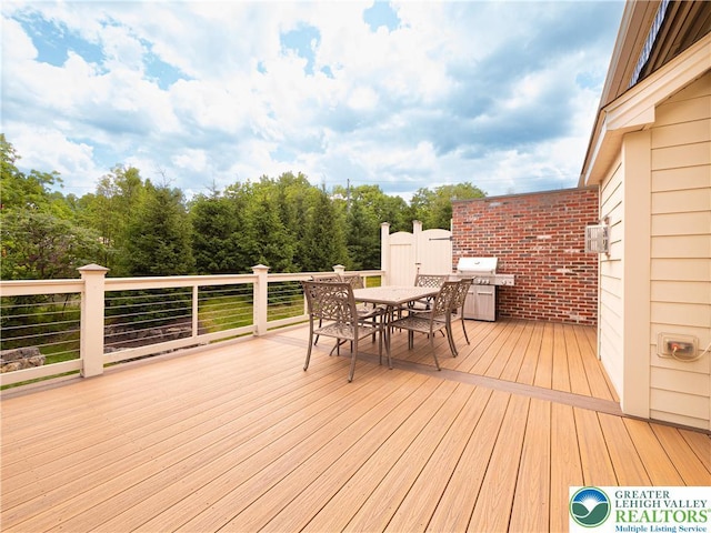 2063 Forge Run, Bethlehem City, PA 18015 - wooden terrace with outdoor dining area and a grill