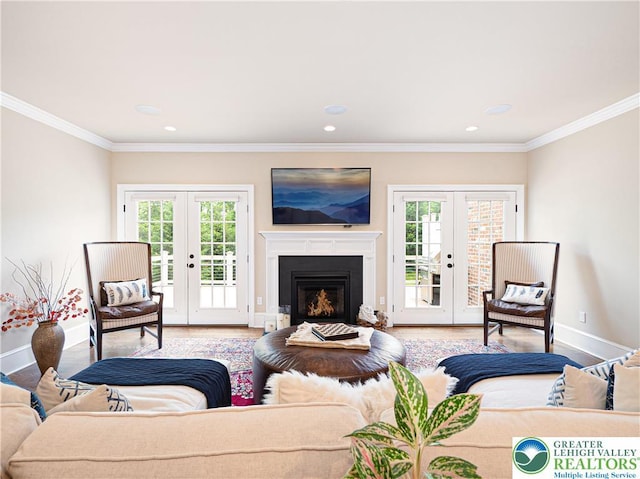 2063 Forge Run, Bethlehem City, PA 18015 - living area with french doors, wood finished floors, crown molding, recessed lighting, and a warm lit fireplace
