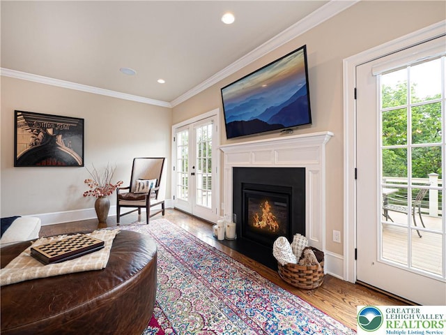 2063 Forge Run, Bethlehem City, PA 18015 - living area with crown molding, wood finished floors, recessed lighting, and a fireplace with flush hearth