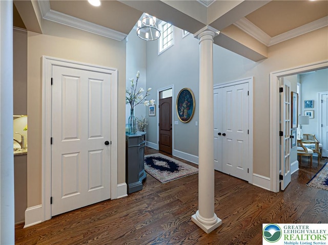 2063 Forge Run, Bethlehem City, PA 18015 - entryway featuring dark wood finished floors, ornamental molding, and ornate columns