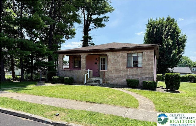 1818 W Jane St, South Whitehall Twp, PA 18104 - bungalow featuring stone siding and a front lawn