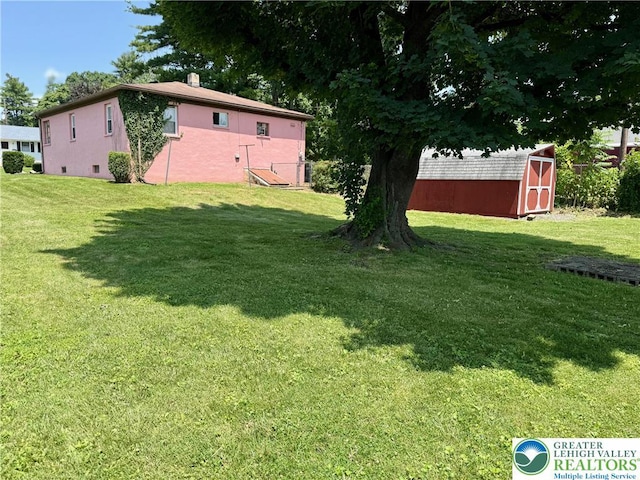 1818 W Jane St, South Whitehall Twp, PA 18104 - view of green lawn featuring a storage unit