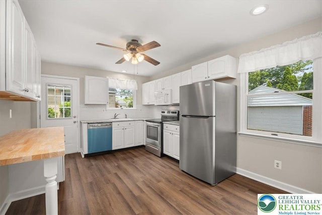 803 Stones Crossing Rd, Palmer Twp, PA 18045 - kitchen featuring stainless steel appliances, white cabinetry, a ceiling fan, dark wood-style flooring, and recessed lighting
