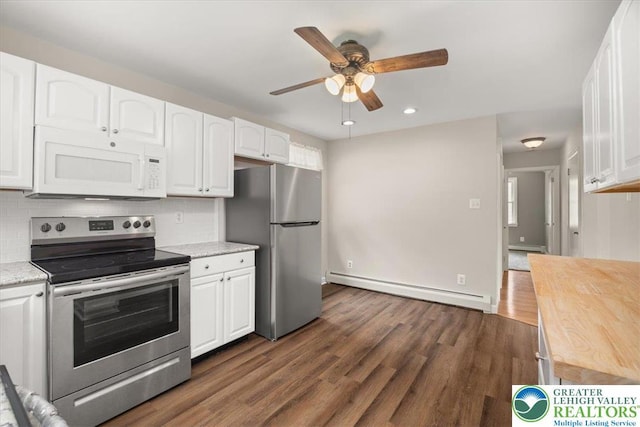 803 Stones Crossing Rd, Palmer Twp, PA 18045 - kitchen featuring appliances with stainless steel finishes, a baseboard heating unit, a ceiling fan, white cabinets, and recessed lighting