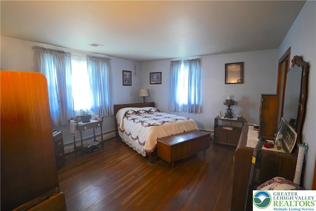 871 2nd St, Whitehall Twp, PA 18052 - bedroom featuring dark wood-style flooring and a baseboard radiator