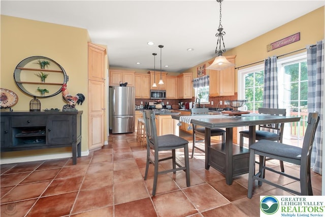 1989 Strathmore Dr, Macungie Boro, PA 18062 - dining room with recessed lighting and light tile patterned floors
