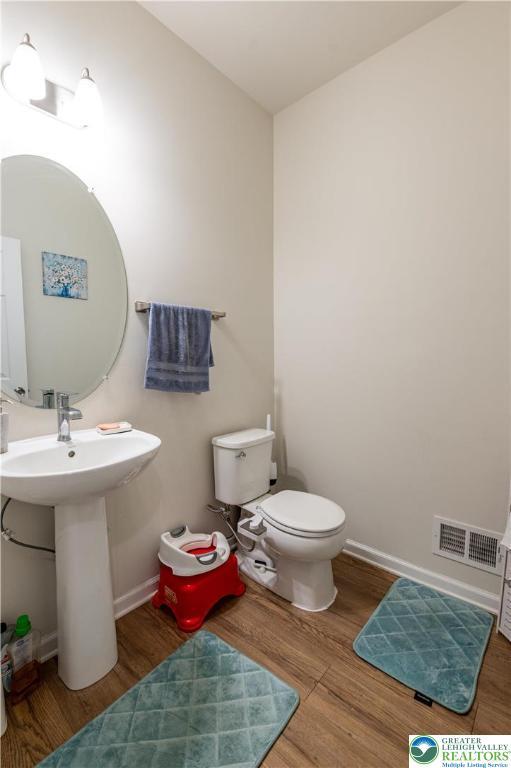 320 Bendelow Ln, Northampton Boro, PA 18067 - bathroom with wood finished floors and toilet