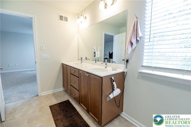 320 Bendelow Ln, Northampton Boro, PA 18067 - bathroom featuring double vanity and tile patterned flooring