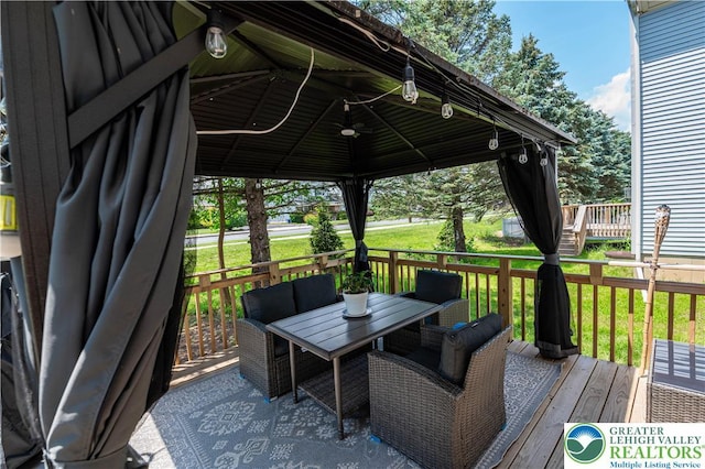 320 Bendelow Ln, Northampton Boro, PA 18067 - deck with a gazebo, outdoor dining space, and a lawn