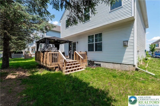 320 Bendelow Ln, Northampton Boro, PA 18067 - back of property with a gazebo, a yard, and a deck