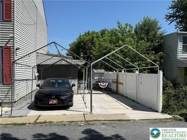 1013 Spruce St, Easton, PA 18042 - view of parking / parking lot featuring a detached carport
