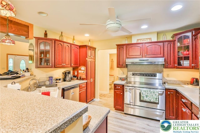 142 Hickory Ln, Chestnuthill Twp, PA 18353 - kitchen featuring appliances with stainless steel finishes, under cabinet range hood, dark brown cabinets, a ceiling fan, and recessed lighting