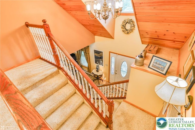 142 Hickory Ln, Chestnuthill Twp, PA 18353 - stairs with carpet flooring and a chandelier