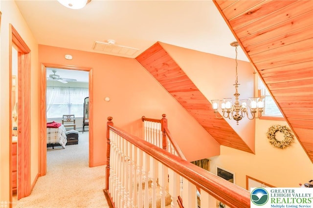 142 Hickory Ln, Chestnuthill Twp, PA 18353 - corridor with an upstairs landing, a chandelier, and carpet flooring