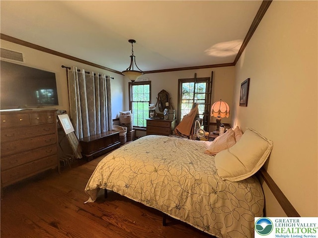 4804 Parkview Dr S, Lower Macungie Twp, PA 18049 - bedroom with dark wood-style flooring and crown molding