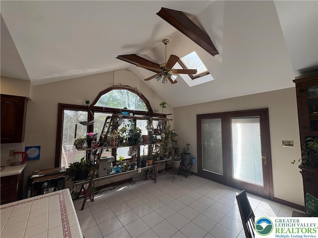 4804 Parkview Dr S, Lower Macungie Twp, PA 18049 - foyer with light tile patterned flooring, a skylight, high vaulted ceiling, and a ceiling fan