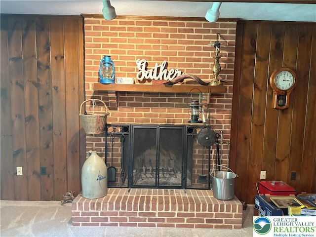 4804 Parkview Dr S, Lower Macungie Twp, PA 18049 - detailed view of wood walls, a brick fireplace, and carpet