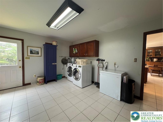 4804 Parkview Dr S, Lower Macungie Twp, PA 18049 - laundry area featuring cabinet space, washing machine and clothes dryer, and light tile patterned floors