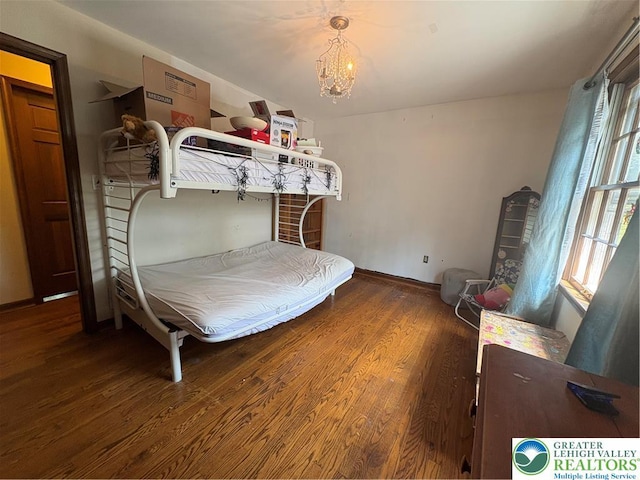 4804 Parkview Dr S, Lower Macungie Twp, PA 18049 - bedroom featuring wood finished floors and a chandelier