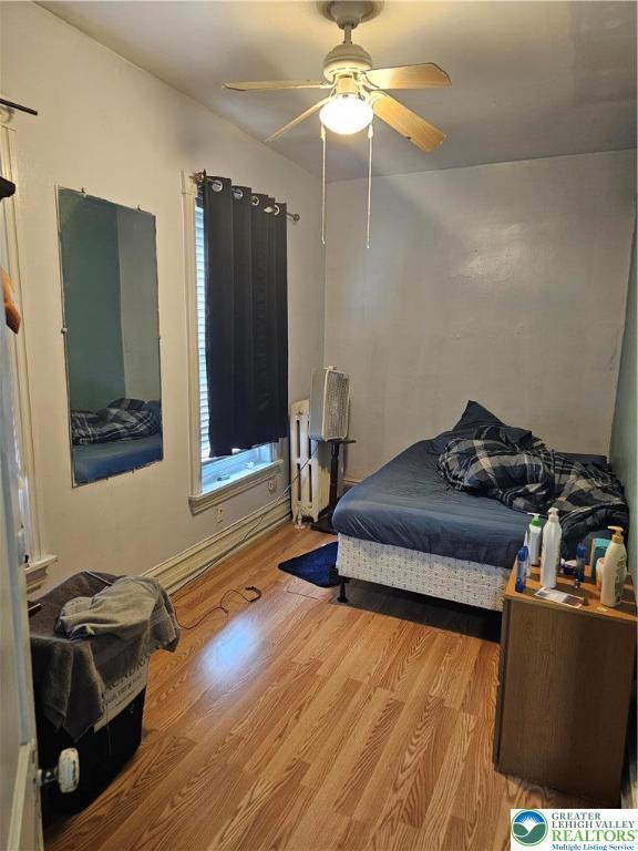 949 W Gordon St, Allentown City, PA 18102 - bedroom with light wood-type flooring and a ceiling fan