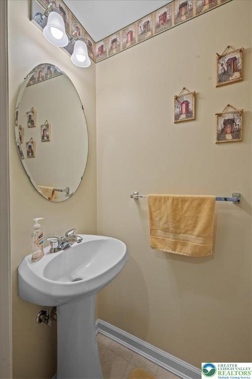4583 Jasmine Dr, Upper Saucon Twp, PA 18034 - bathroom with baseboards and tile patterned floors