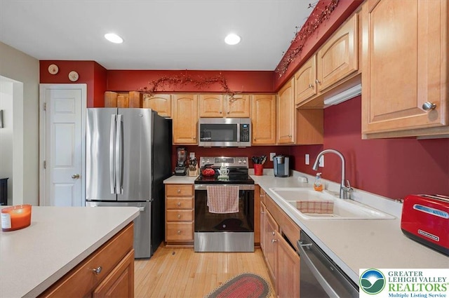 4583 Jasmine Dr, Upper Saucon Twp, PA 18034 - kitchen with appliances with stainless steel finishes, light wood-style flooring, light countertops, and recessed lighting