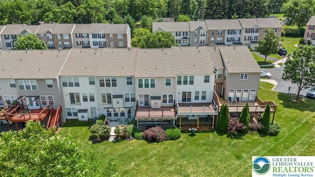 4583 Jasmine Dr, Upper Saucon Twp, PA 18034 - back of house with a residential view and a yard